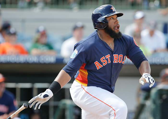 Mar 16, 2016; Kissimmee, FL, USA; Houston Astros designated hitter Jon Singleton (21) hits a two run double to right field during the sixth inning of a spring training baseball game against the Detroit Tigers at Osceola County Stadium. The Tigers won 7-3. Mandatory Credit: Reinhold Matay-USA TODAY Sports